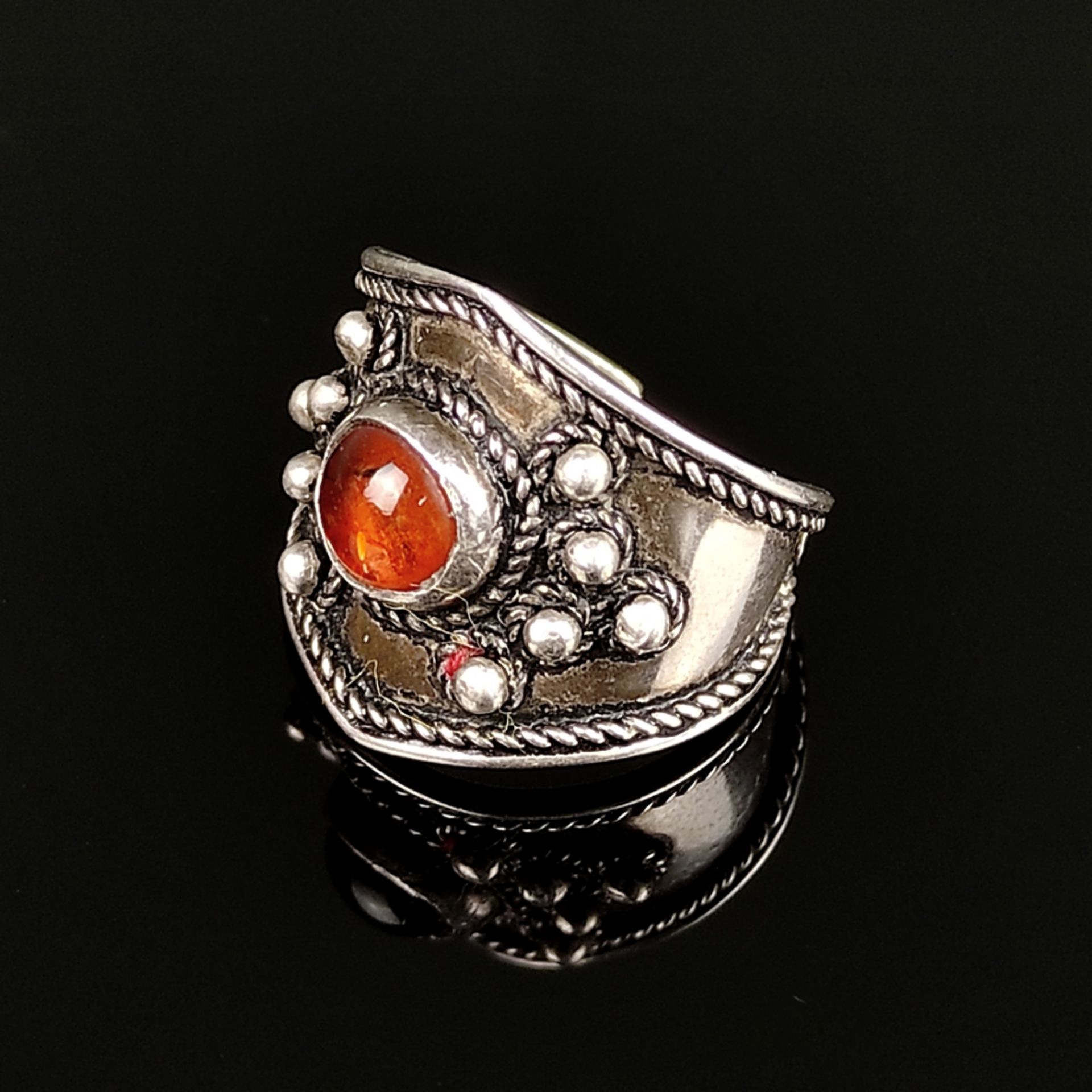 Antique amber ring, silver 925 (hallmarked), 6,0g, centre set with oval transparent honey amber cab