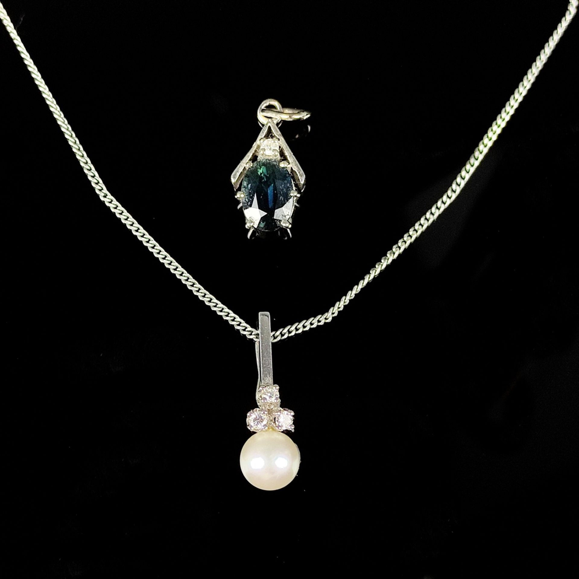 Two pendants and flat anchor chain, 3 pieces, pearl pendant with three diamond roses, 585/14K white