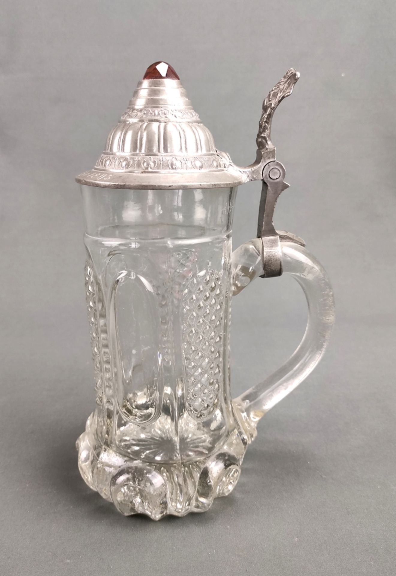 Glass jug with pewter mount, ornamental cut, stepped decorated pewter lid with cut gemstone, lid en