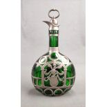 Bottle with decorative pewter frame, green glass, with cork stopper, on one side decorated with kni
