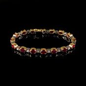 Exklusives Rubin- Brillant- Armband, Gliederarmband, 750/18K Weiß-/ Gelbgold (punziert), 22,1g, bes