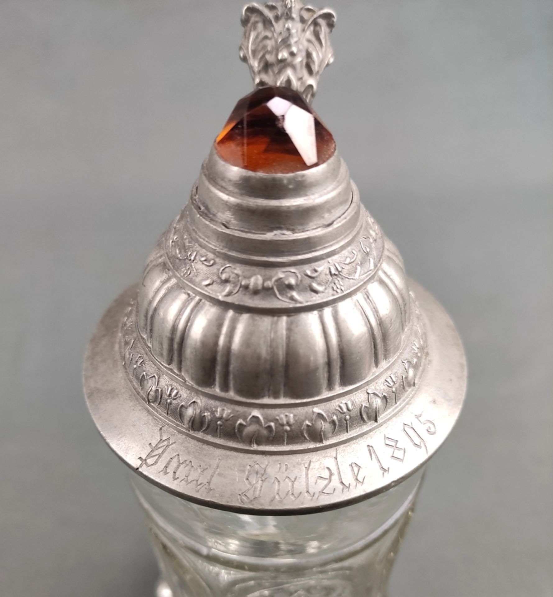 Glass jug with pewter mount, ornamental cut, stepped decorated pewter lid with cut gemstone, lid en - Image 3 of 3