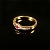 Rubin Diamant Ring, 750/18K Gelbgold (punziert), 2,69g, mittig oval facettierter Rubin, Ringschiene
