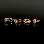 Konvolut aus vier Ringen, 333/585 Gelb- und Weißgold, bestehend aus einem Rubin Ring mit Diamantros
