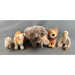 Convolute of stuffed animals, 5 pieces, consisting of: Wild boar, stuffing of wood wool, patched at