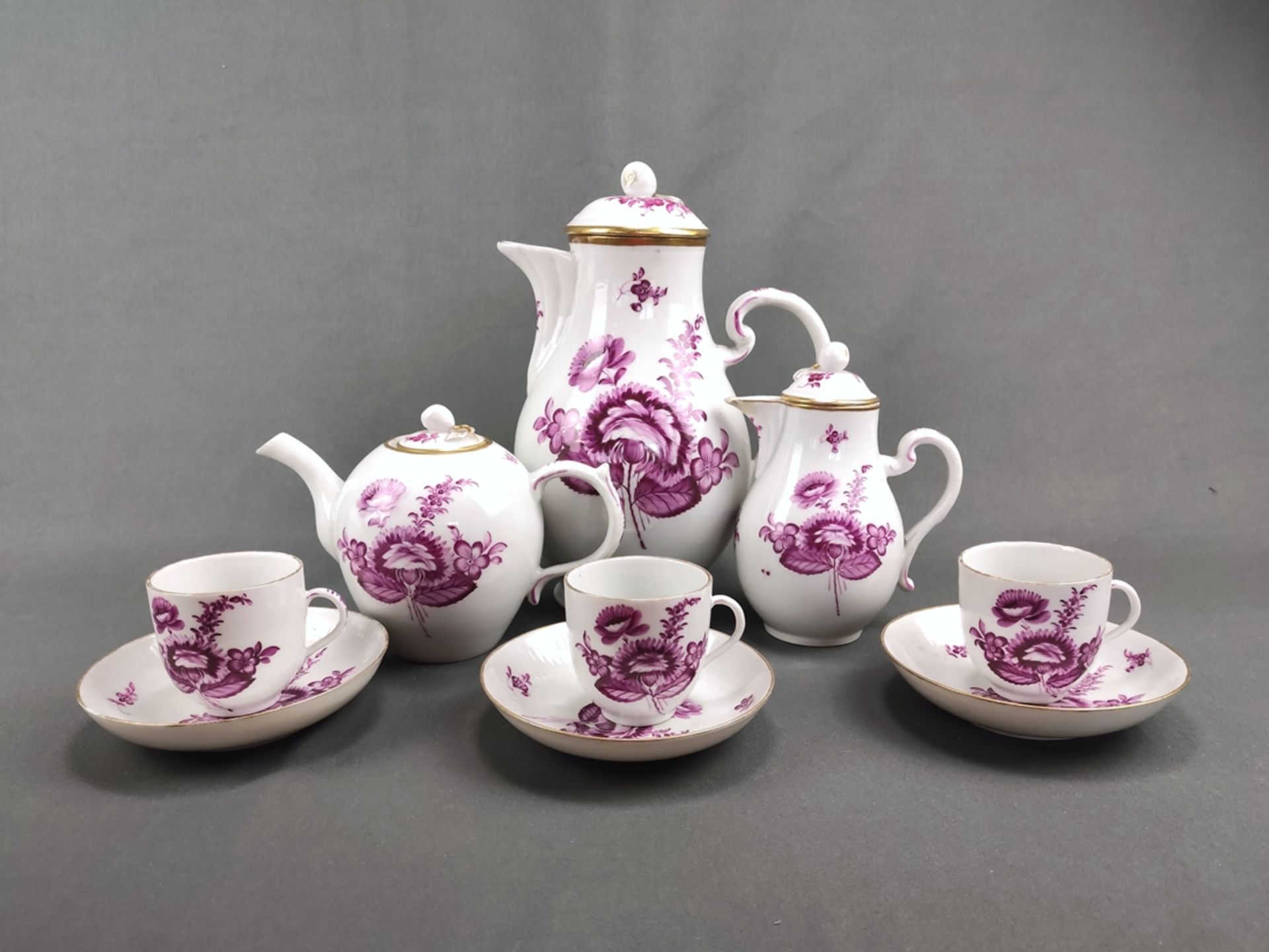 Three teapots and three mocha cups with saucers, Volkstedt Rudolstadt, around 1900, purple floral p