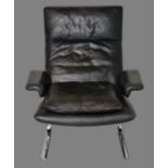 Black leather armchair / lounge chair "De Sede", Hans Eichenberger around 1970, chrome base, black