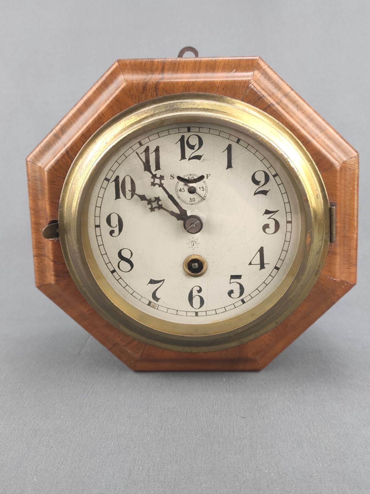 Wanduhr, achteckig Junghans, Holzkorpus mit aufklappbarer Glasfront, Maße Uhr ca. 18x18x9cm