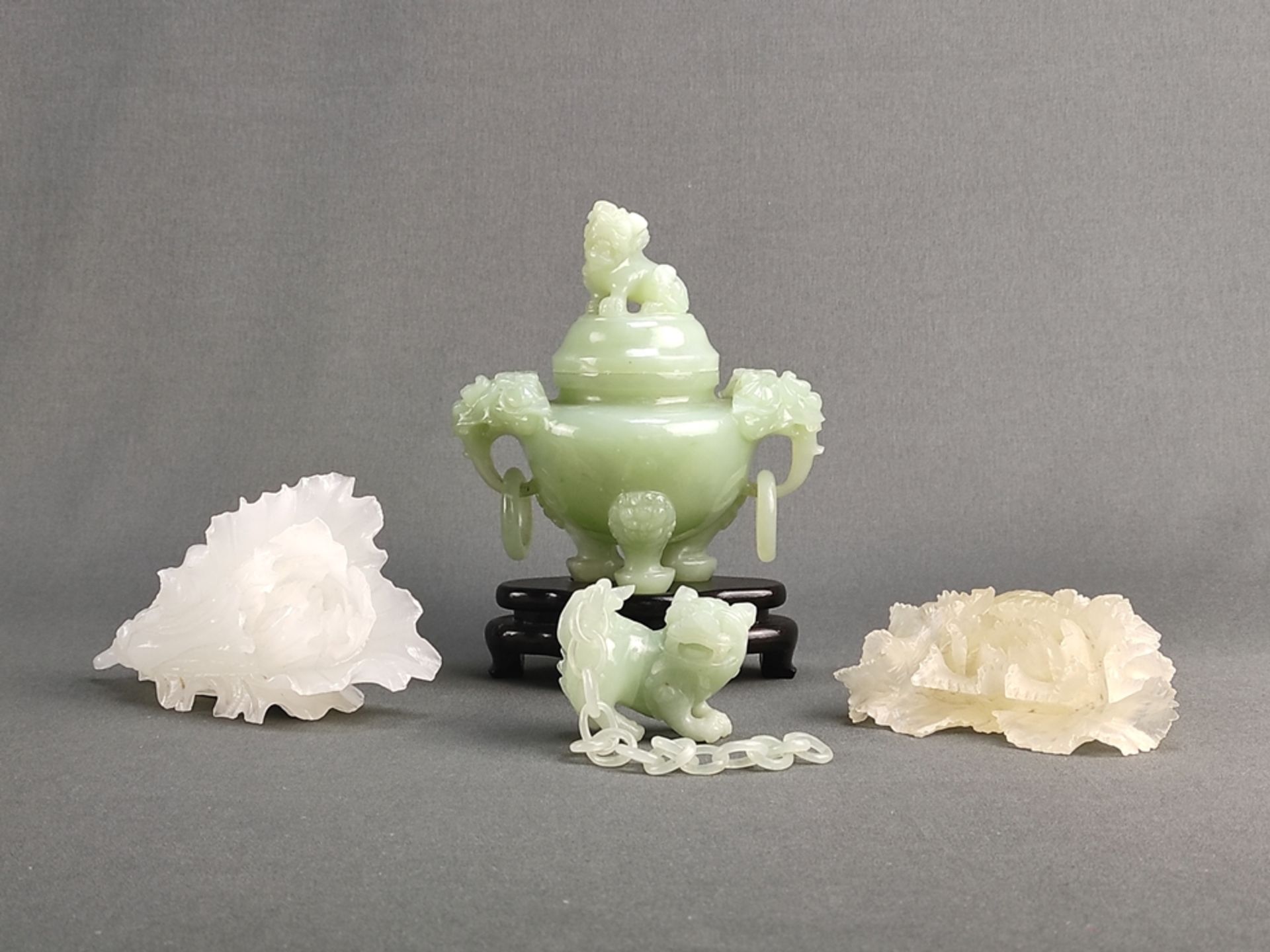 Convolute of jade carvings, Asian, 4 pieces, consisting of: lidded vessel with 3 lion feet, on a wo