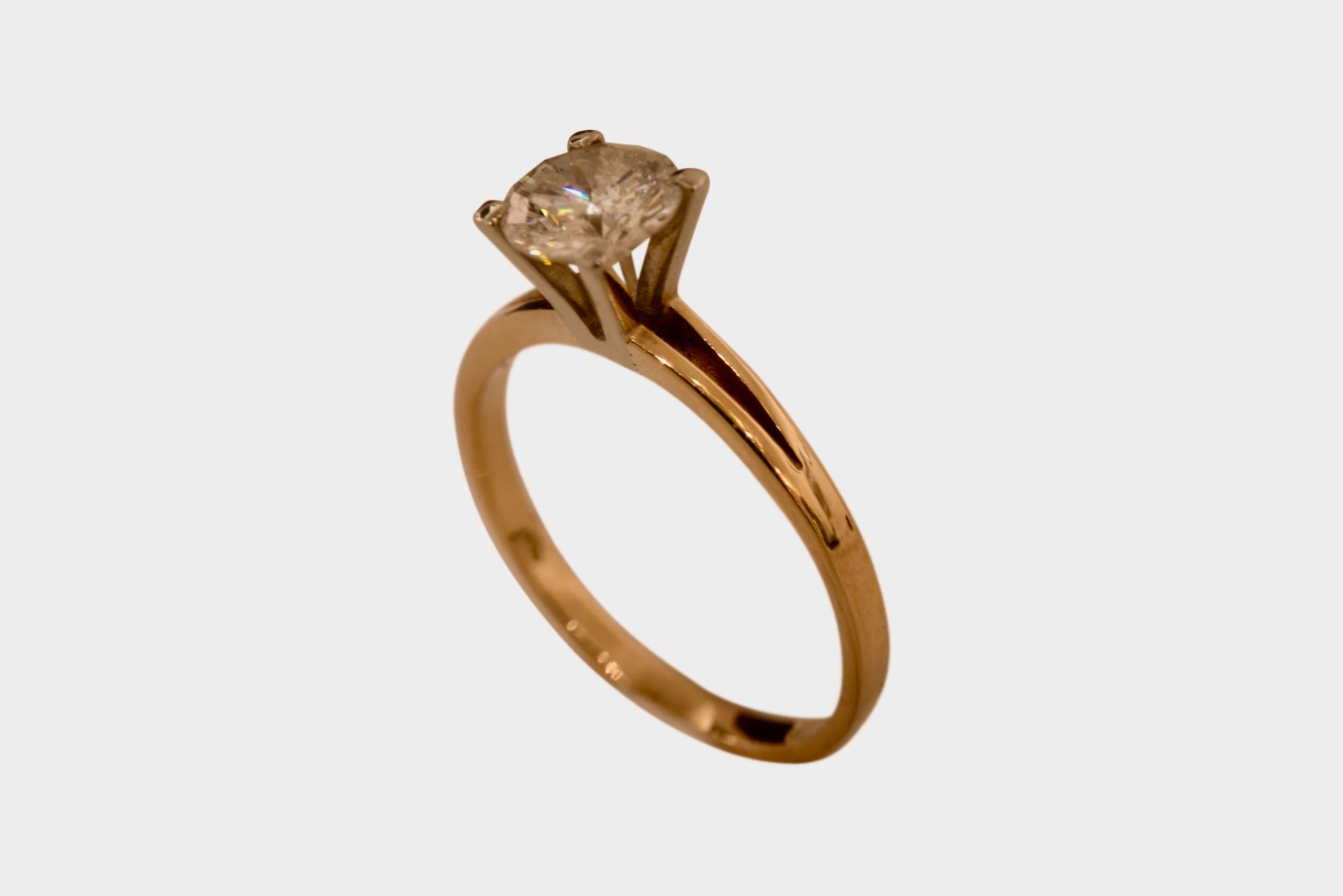 Ring GG/WG 585/fein mit einem Brillanten|Ring with One Brilliant-Cut Diamond