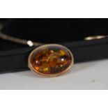 9ct Gold amber stone and matching 9ct necklace and earrings