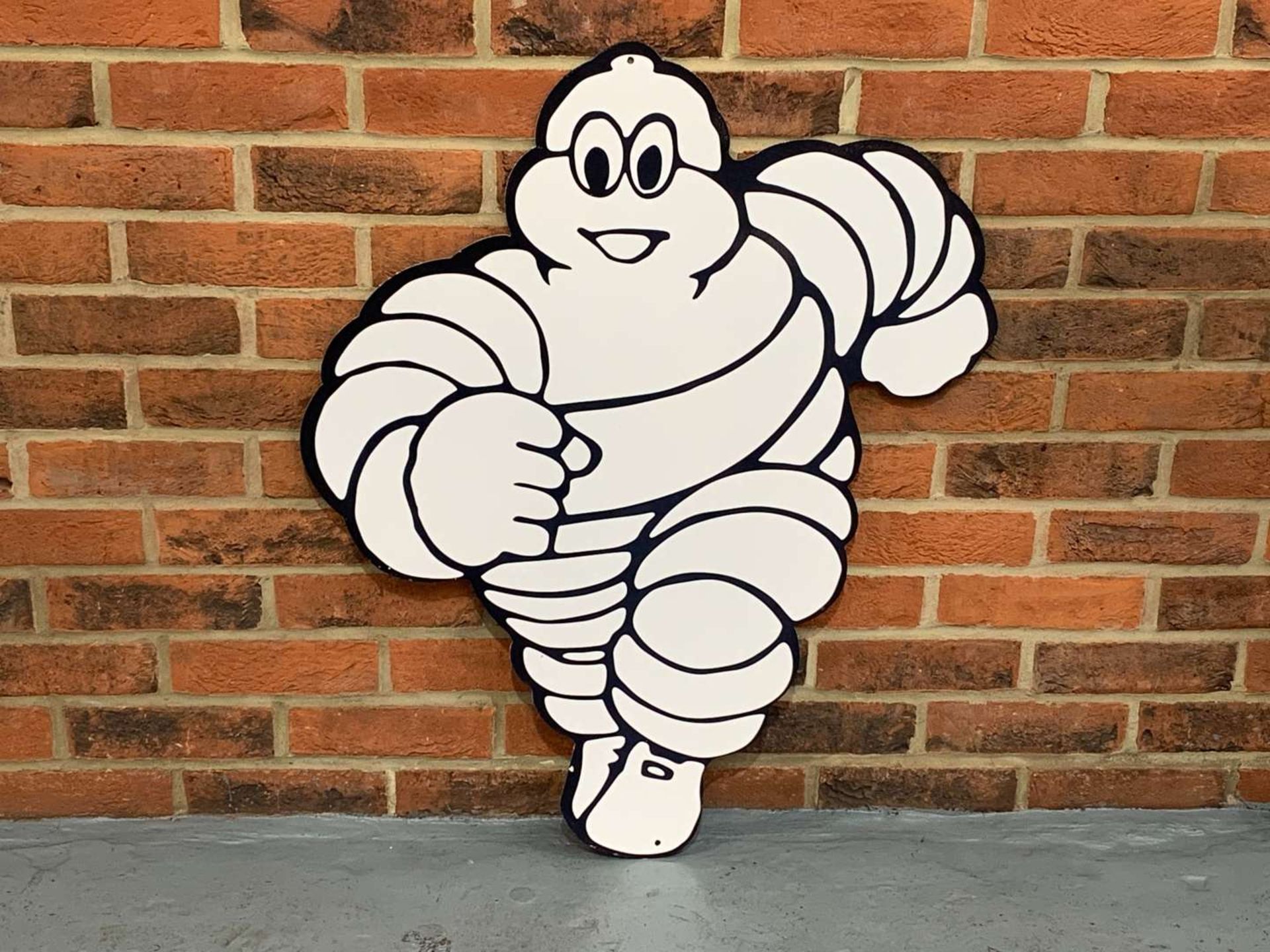 Metal Michelin Running Man Sign