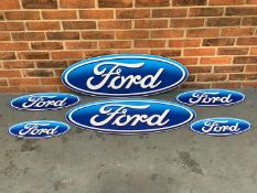 Six Ford Emblem Signs