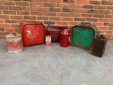 Seven Vintage Oil Cans