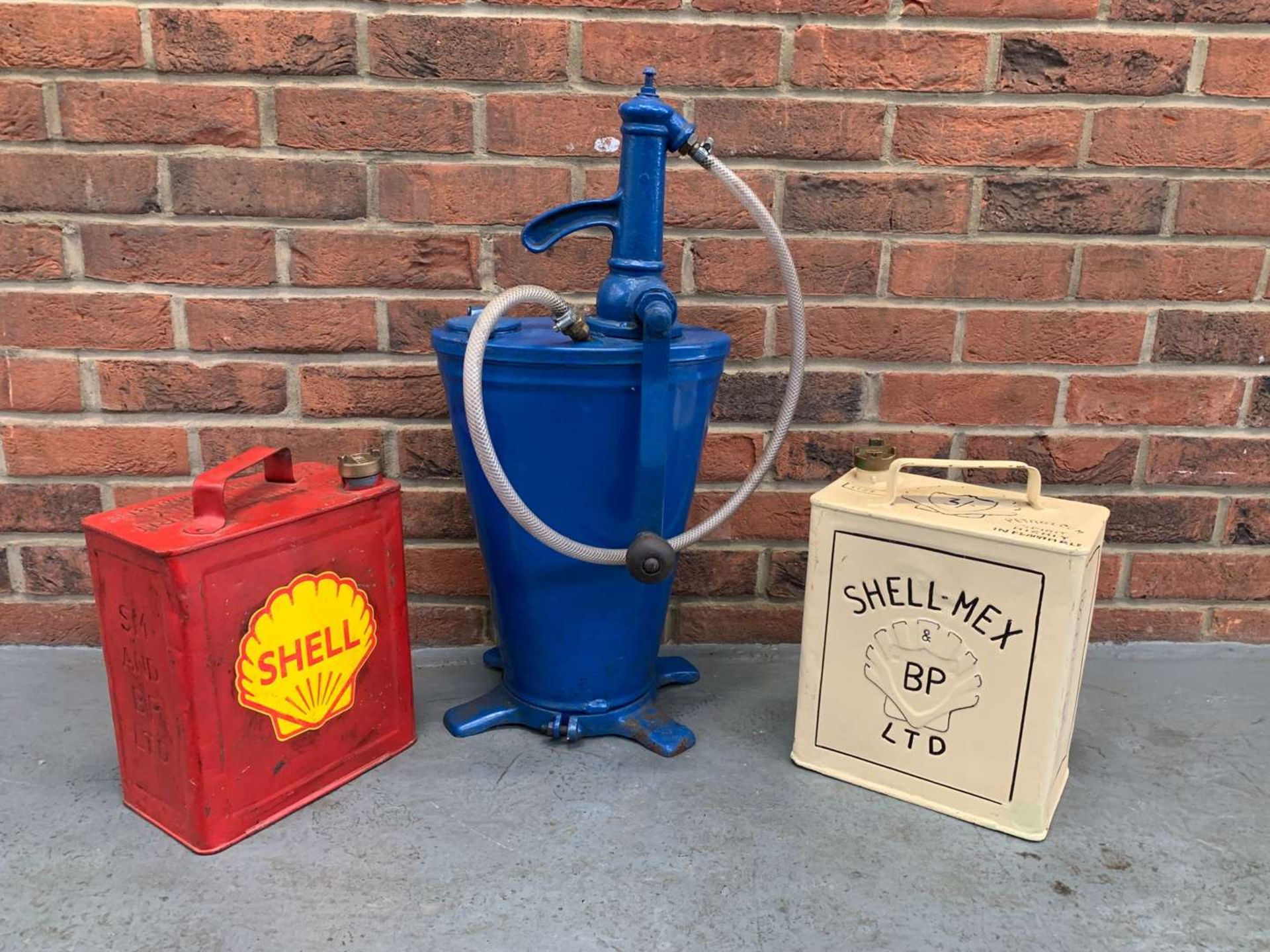 Forecourt Oil Dispenser and Two Five Gallon Fuel Cans (3)