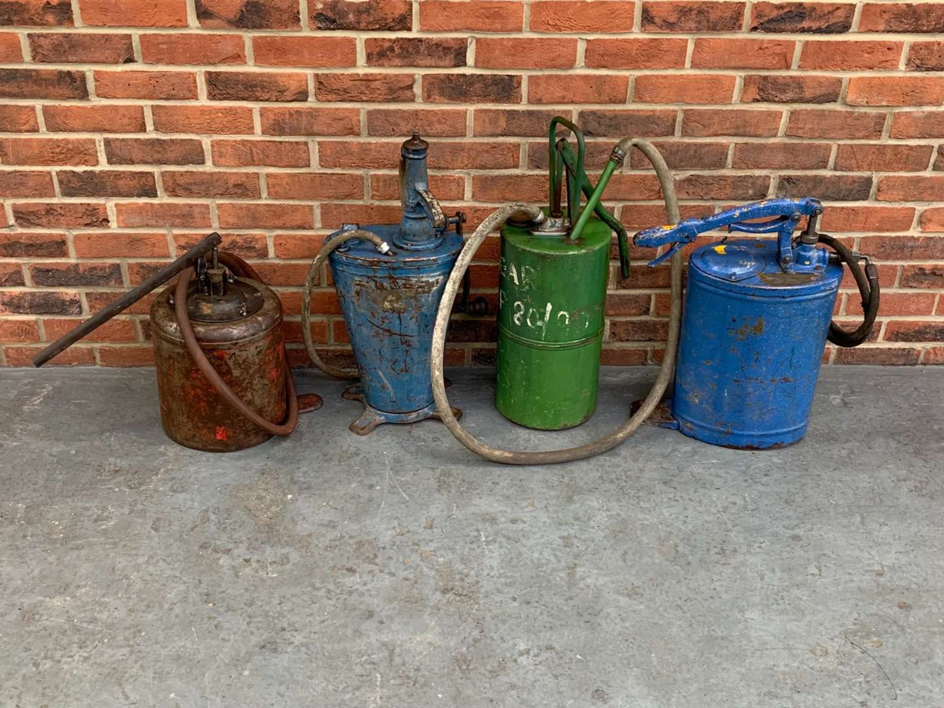 Four Forecourt Oil Dispensers