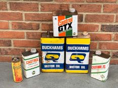 Six Duckhams and Castrol Oil Cans