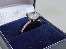 14ct white gold solitaire claw set Diamond ring