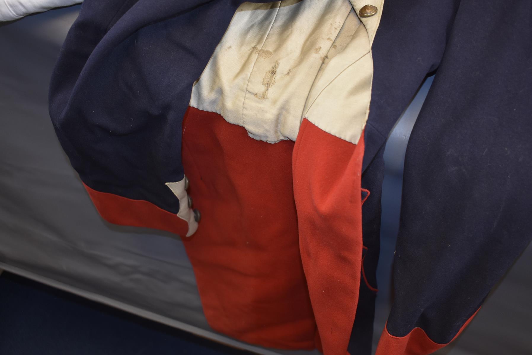 A FRENCH FIREMAN'S FULL DRESS COATEE. Navy blue cloth with scarlet cloth collar, cuffs and turn - Image 4 of 7