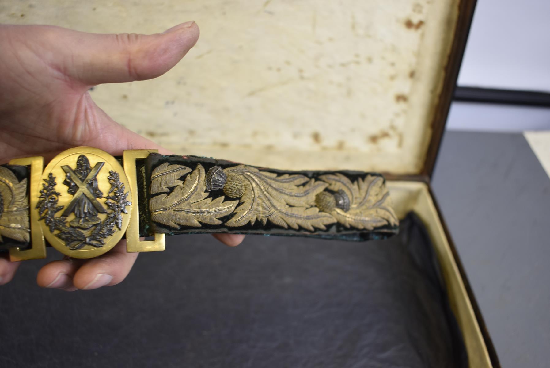 A CASED CAMERON HIGHLANDERS OFFICER'S DRESS SPORRAN ENSEMBLE, the copper gilt cantle profusely - Image 13 of 16