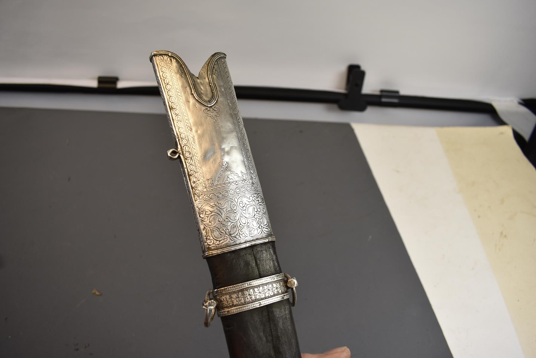 A 19TH CENTURY ARAB SAIF OR SWORD, 75cm double fullered blade, characteristic white metal hilt, - Image 12 of 14