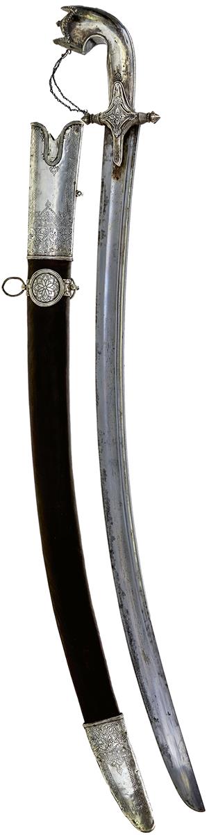 A 19TH CENTURY ARAB SAIF OR SWORD, 75cm double fullered blade, characteristic white metal hilt,