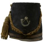 A CONTINENTAL STYLE THEATRICAL SHAKO. Stiffened blue cloth, unbound soft leather peak, sewn-in cap