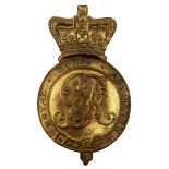 ROYAL HORSE ARTILLERY SIDE BADGE FOR THE FUR CRESTED LEATHER HELMET, C.1793-1822. A fine and rare
