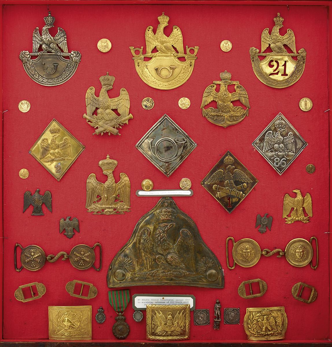 IMPERIAL FRENCH SHAKO PLATES, A FUR CAP PLATE, WAIST BELT PLATES AND CLASPS, OTHER BADGES AND