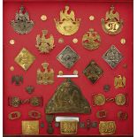 IMPERIAL FRENCH SHAKO PLATES, A FUR CAP PLATE, WAIST BELT PLATES AND CLASPS, OTHER BADGES AND