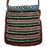 A LATE 19TH OR EARLY 20TH CENTURY ZULU BEADED POUCH, the necklace based ppouch with top flap, linear