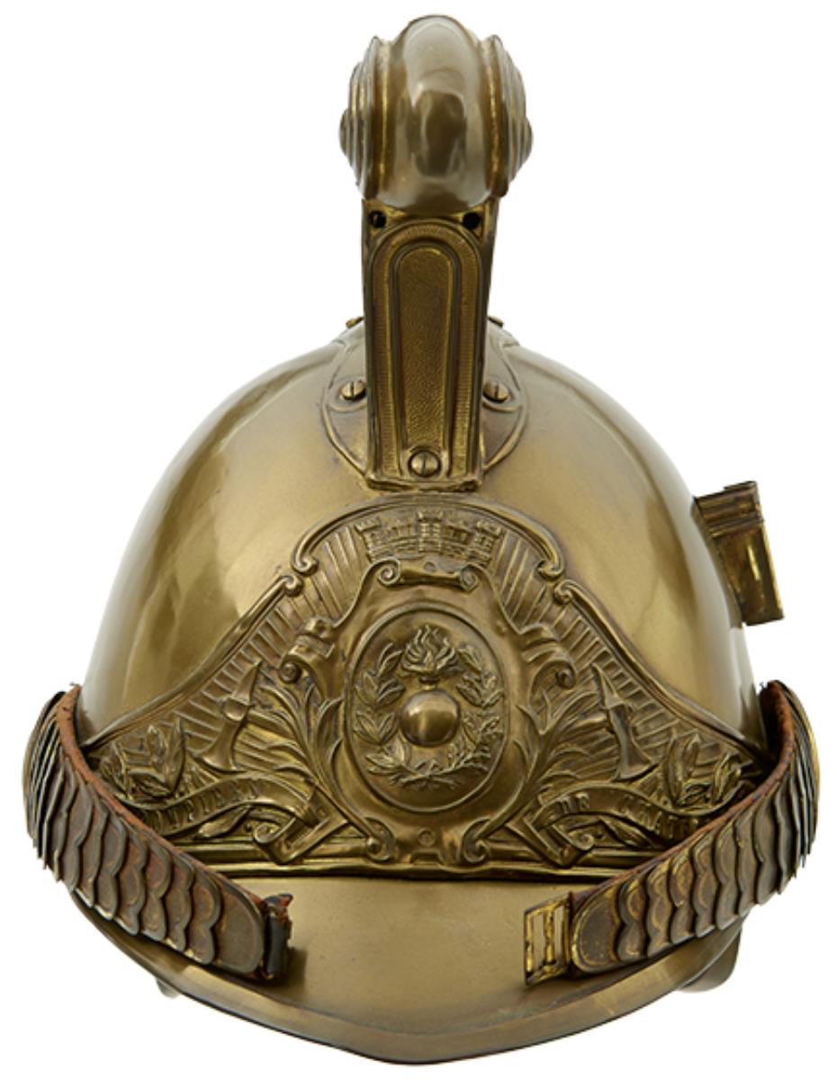 A FRENCH FIREMAN'S HELMET FOR THE CHATEAUDUN SERVICE, A good quality all brass example, raised crest