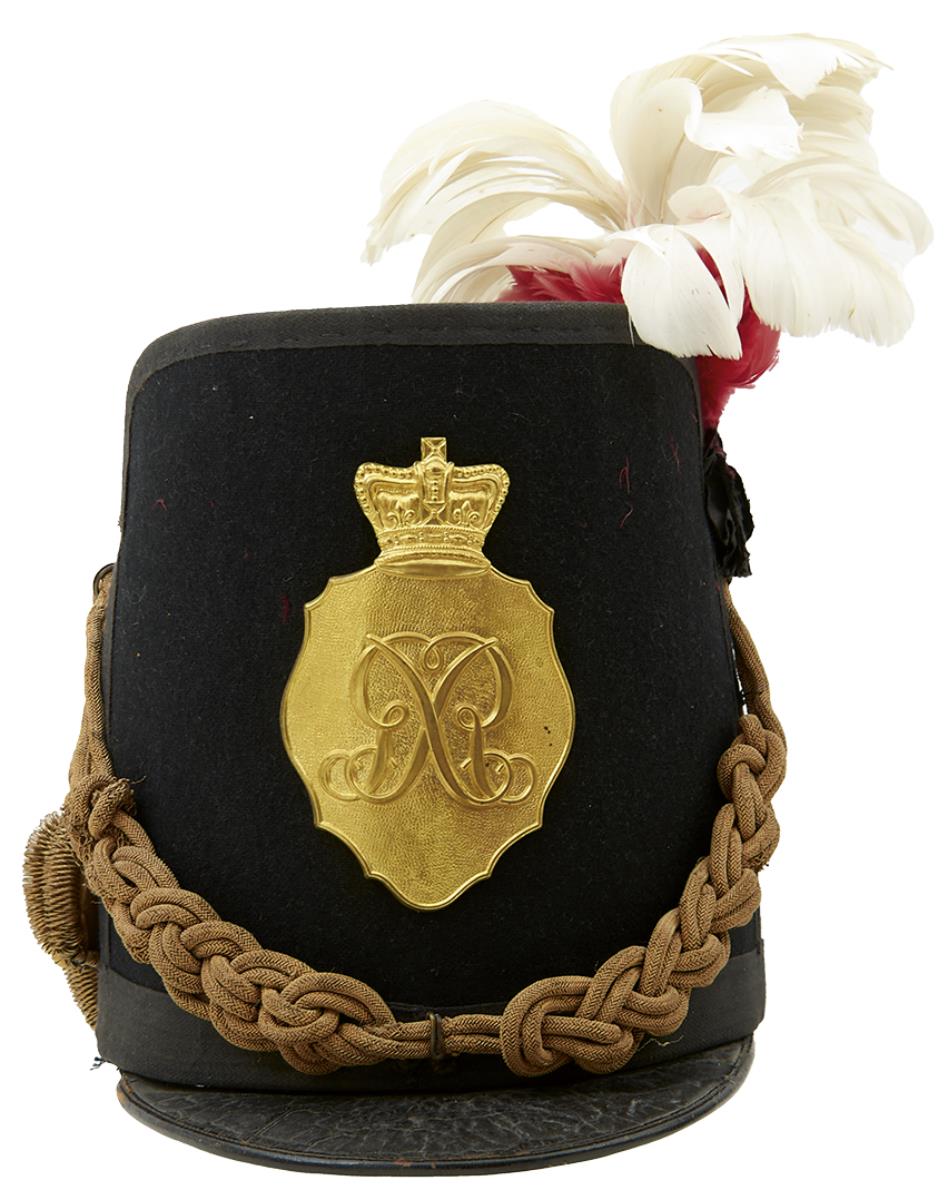 AN OFFICER'S 1812-1816 REPLICA SHAKO. Late 19th or early 20th Century example in stiffened navy blue