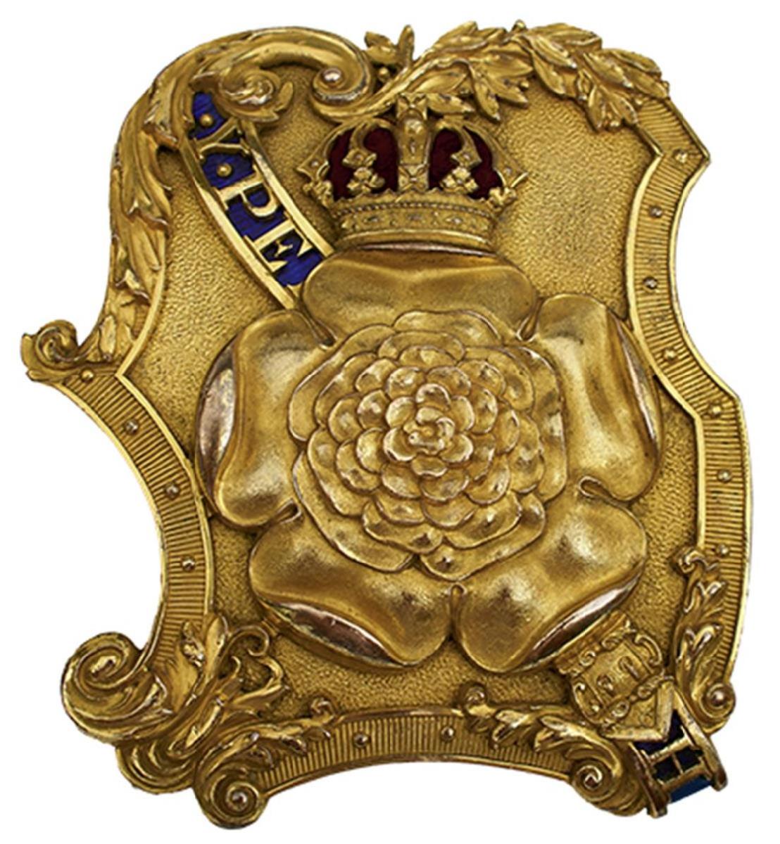 A 7TH (ROYAL FUSILIERS) OFFICER'S SHOULDER BELT PLATE, the two-piece rococo plate decorated with