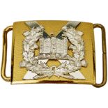 A KING'S OWN SCOTTISH BORDERERS WAIST BELT CLASP, the stippled gilt plate applied with a white metal