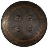 A SIKH INFLUNCED SHIELD OR DHAL, 44cm diameter steel body decorated with hunting scenes amidst