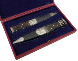 AN HISTORIC CASED PAIR OF SCOTTISH OFFICER'S SGIAN DUBH PRESENTED TO LIEUTENANT COLONEL WILLIAM ROBE