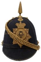 AN OTHER RANK'S TATTOO BLUE CLOTH HELMET TO THE SOUTH WALES BORDERERS,