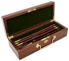 A CASED PRESENTATION GUN CLEANING KIT,