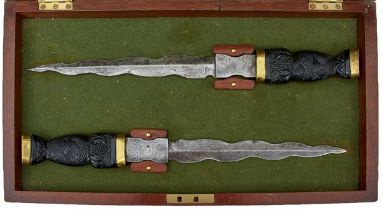 AN UNUSUAL CASED PAIR OF SCOTTISH CEREMONIAL DIRKS,