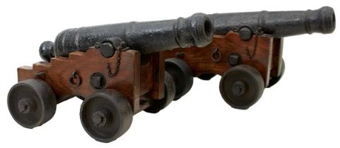 A PAIR OF 7-BORE CAST IRON SIGNALLING CANNON,