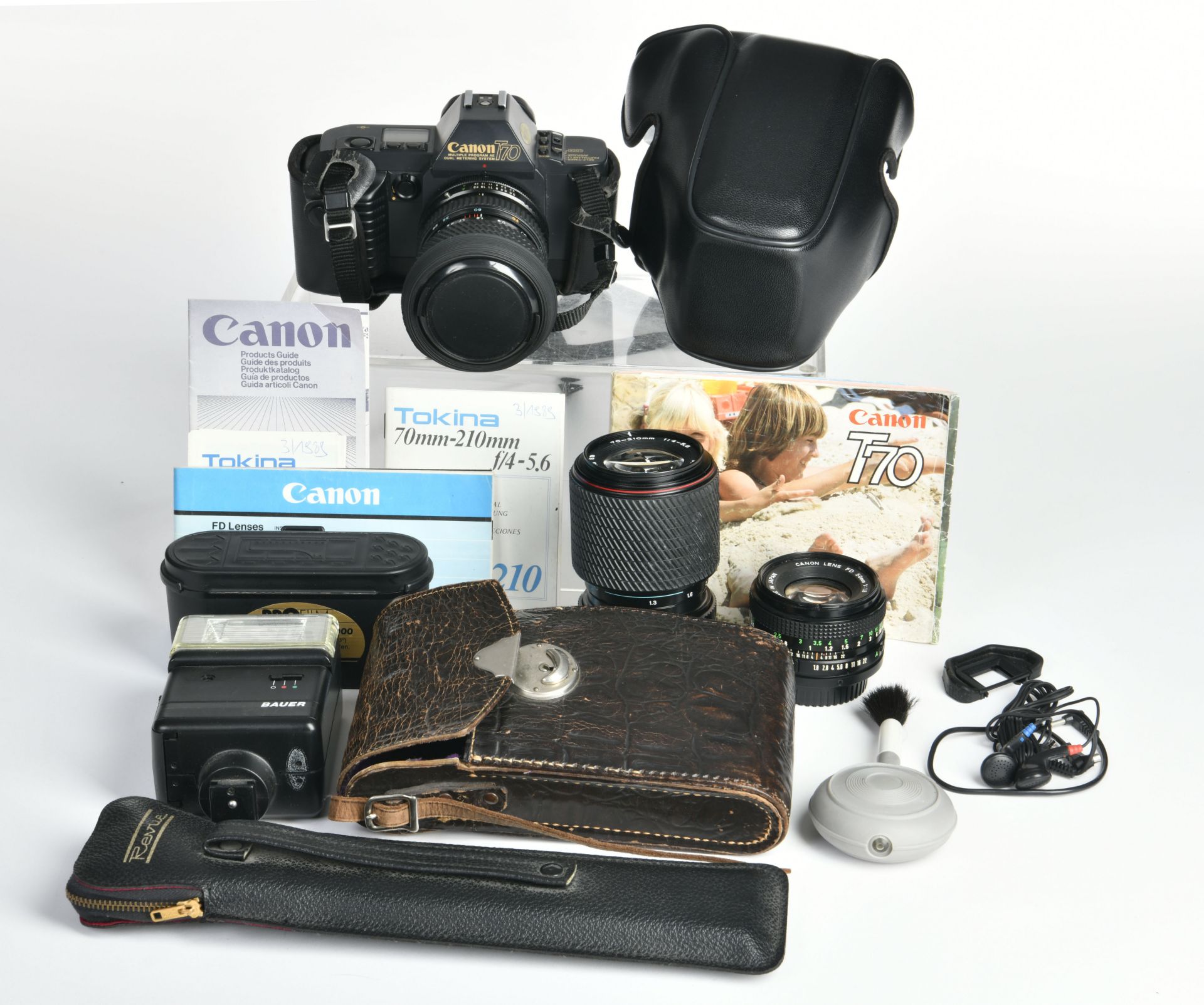 Canon, T 70 reflex camera with 1,8 50mm and Tokina 28-70,70-210mm+Bauer flash unit, C 2/2-