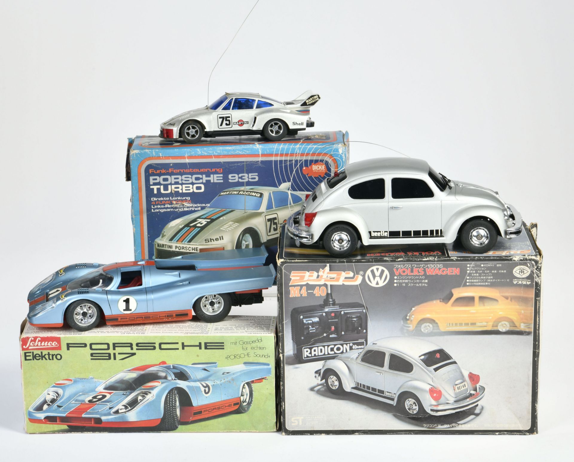 Schuco a.o., 2x Porsche + VW Käfer, plastic, not checked, paint d., box, C 2-3