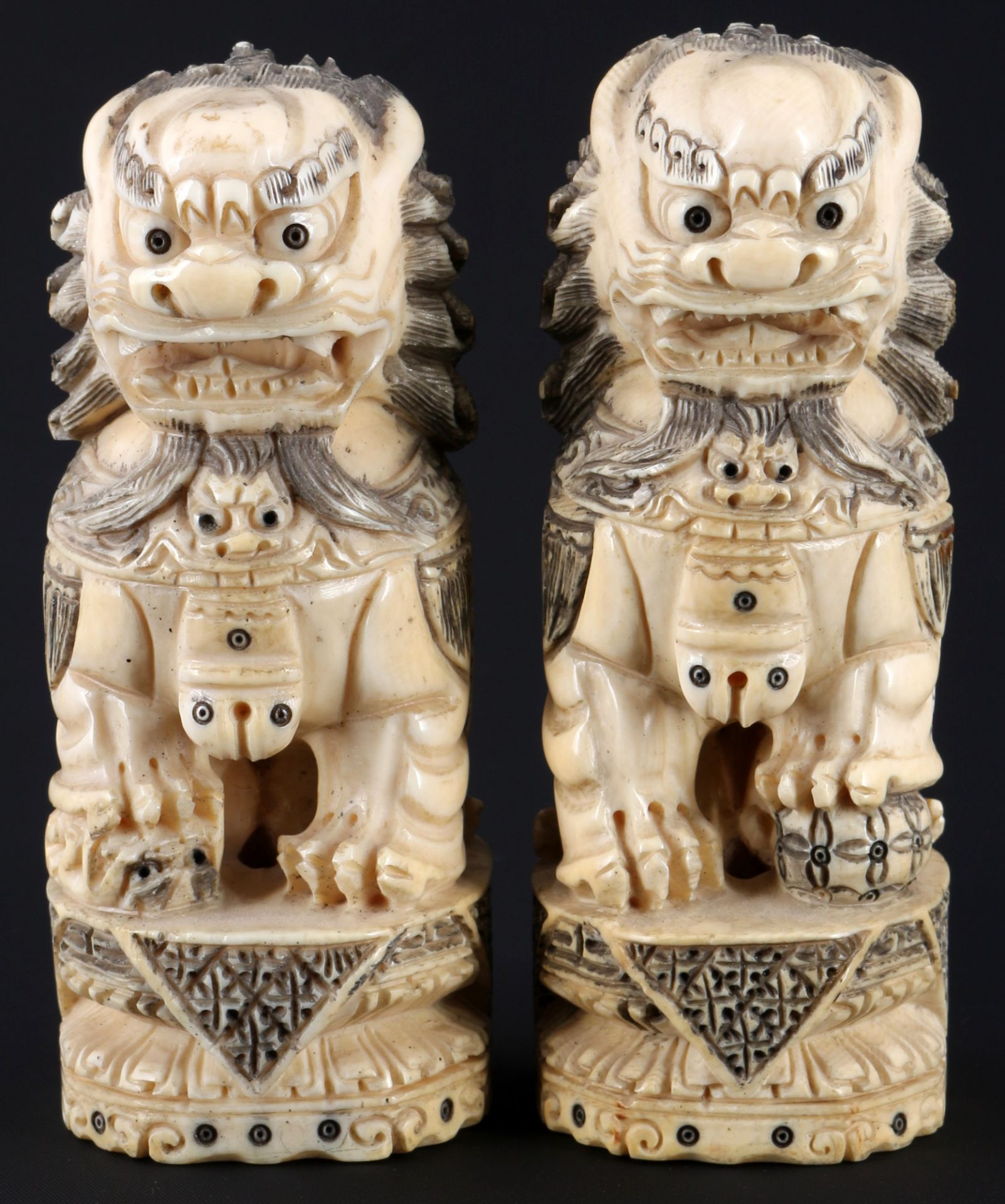 China ivory large pair of shishi guardian lions, Qing dynasty around 1900,