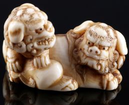 Japan 18th/19th Century, ivory Katabori-Netsuke Shishi pair, Edo period,