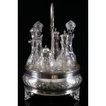 Victorian cruet set with 6 bottles,