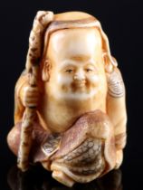 Japan 19th century, ivory Netsuke Fukurokuju god of luck, signed, Meiji period,