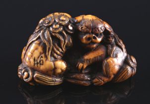 Japan 18th century, ivory Katabori-Netsuke Shishi pair, Edo period,