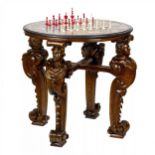 Impressive chess table with precious Roman mosaics on carved legs.
