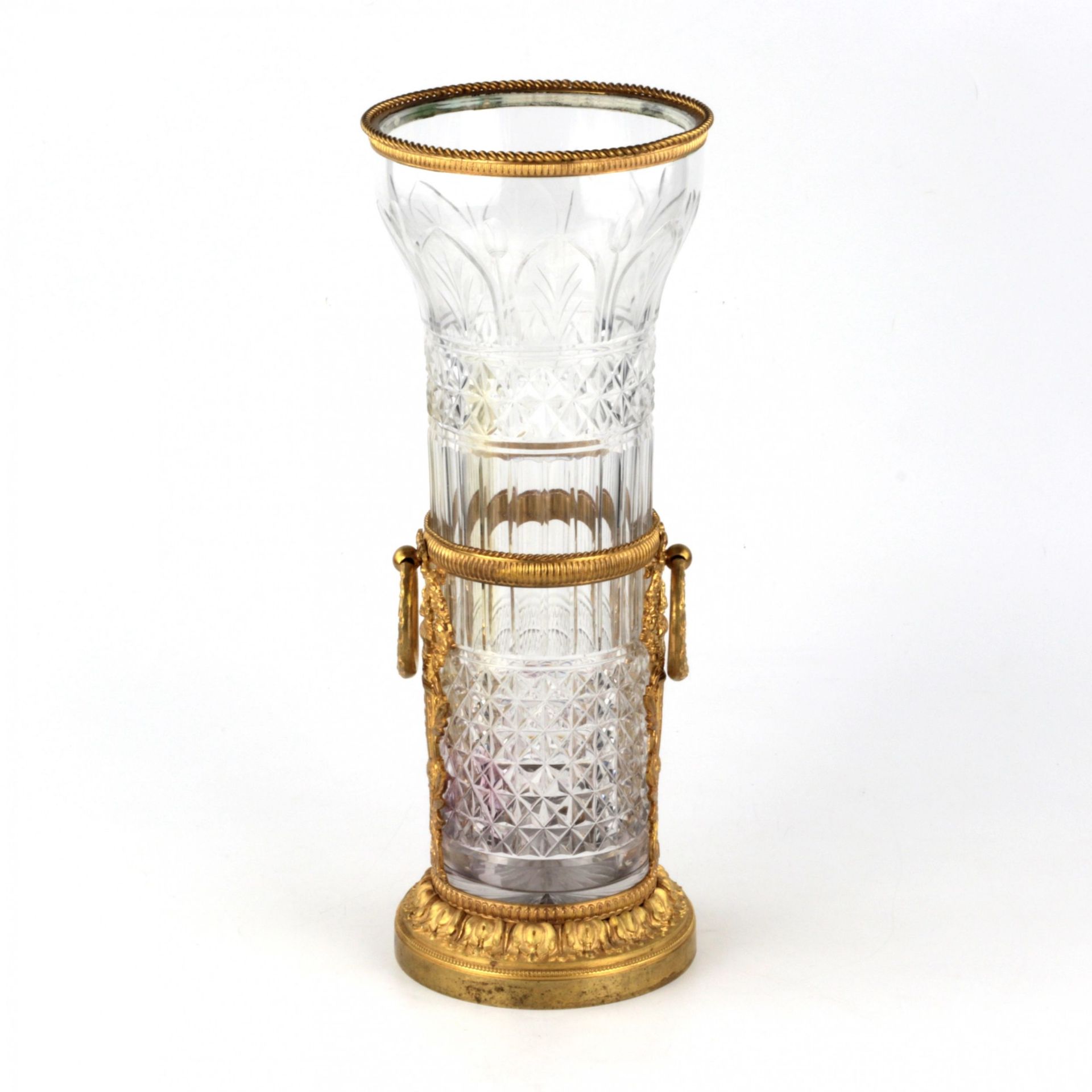 Crystal vase in gilded bronze.